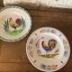 Two collection plates hand-painted rooster pattern signed fab Quimper and wolf mill hamage
