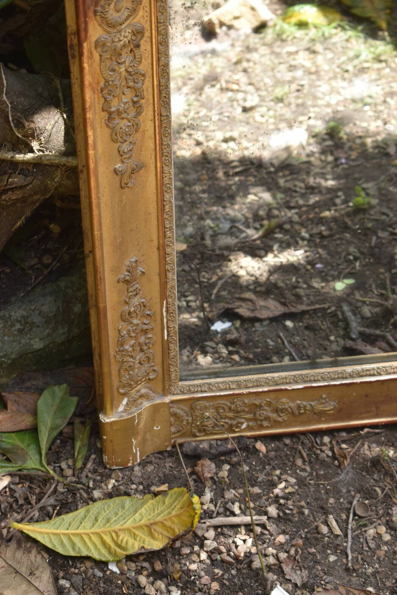 Large gilded Empire mirror from the 19th century.