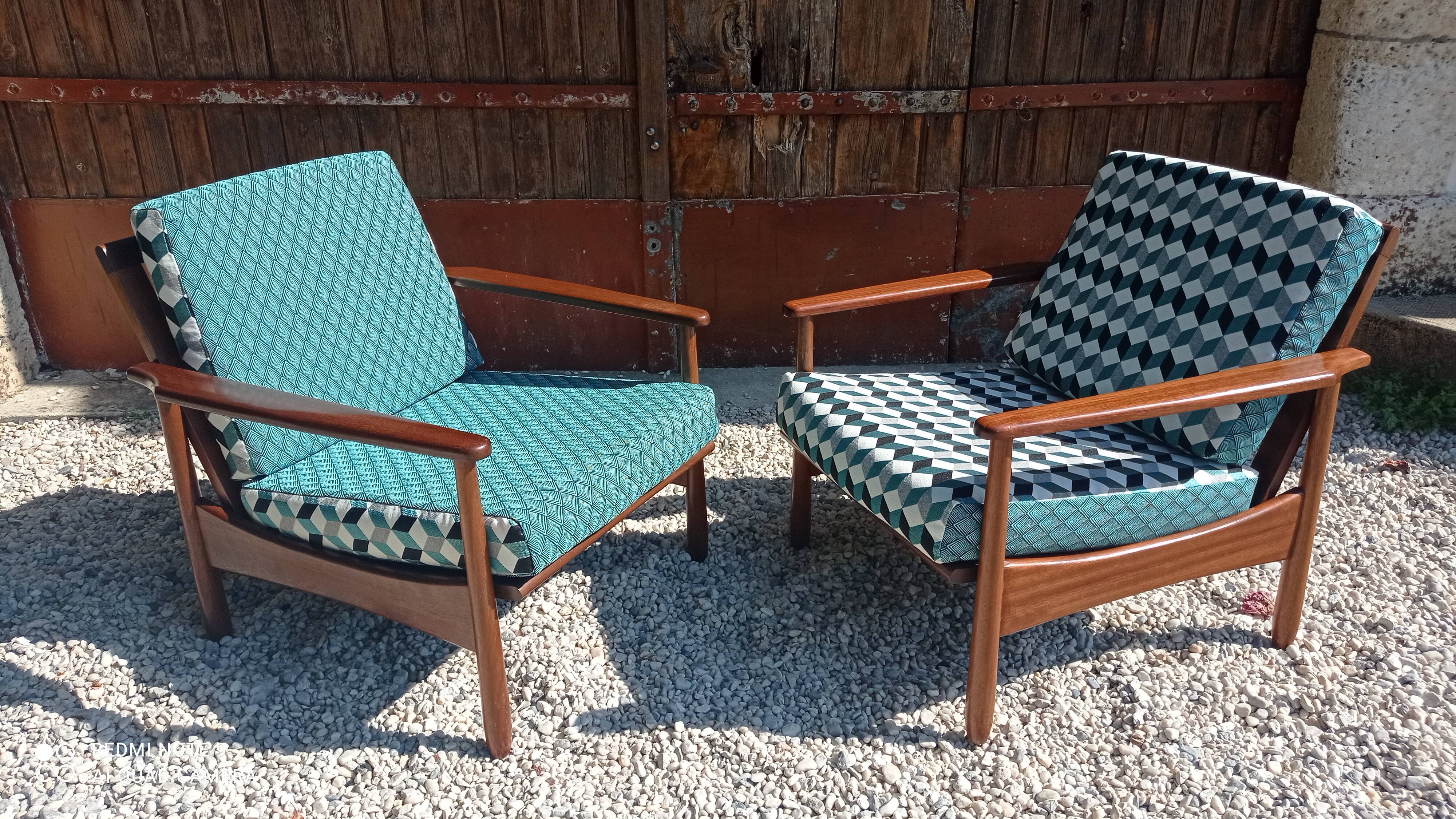 Teak armchairs