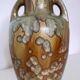 Iridescent crystal-glazed ceramic vase, with two handles, decorative piece.