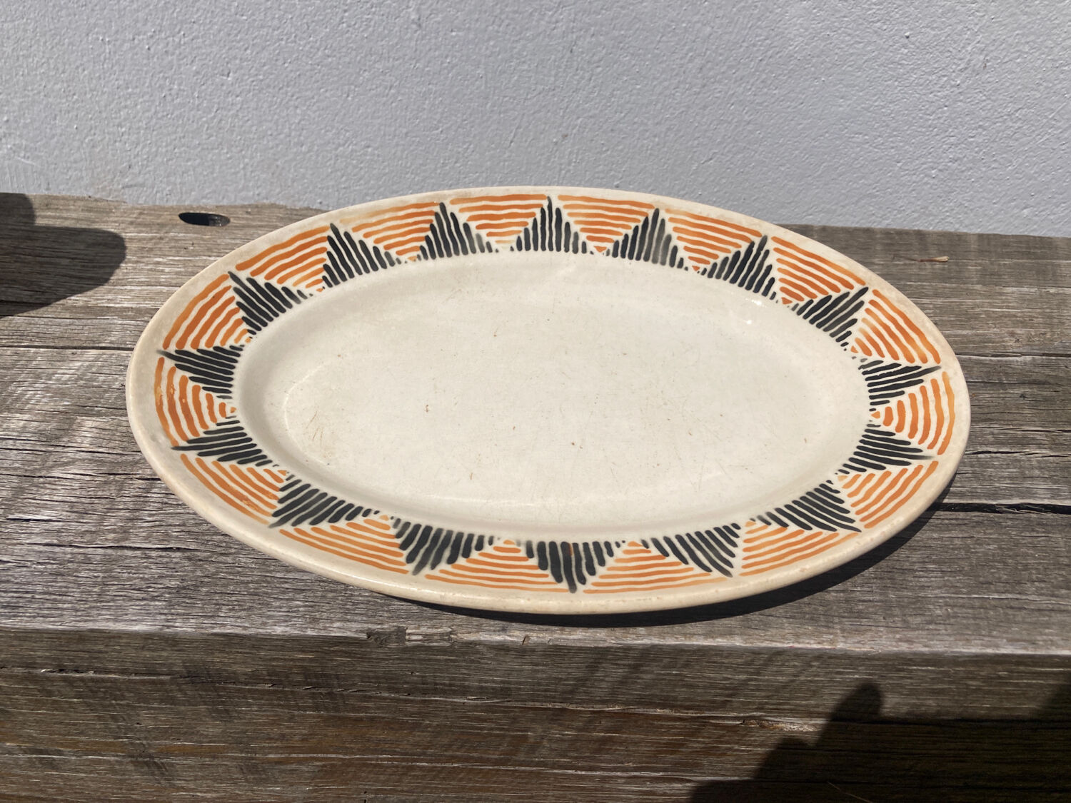 Sun yellow oval ceramic dish Badonviller model Etoile