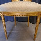 Pair of Napoleon III chairs in gilded wood