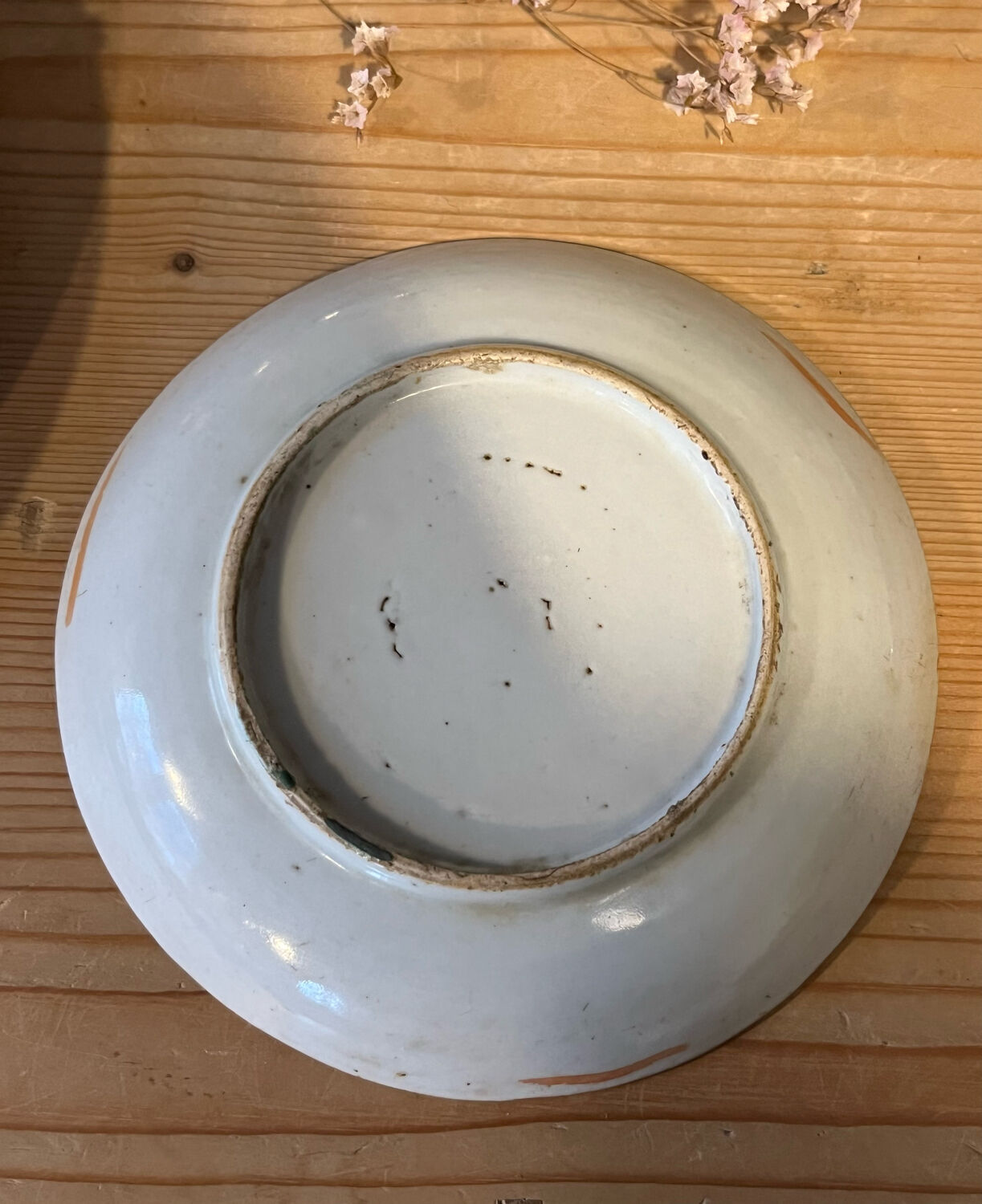 Ceramic cup with floral motif