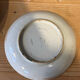 Ceramic cup with floral motif