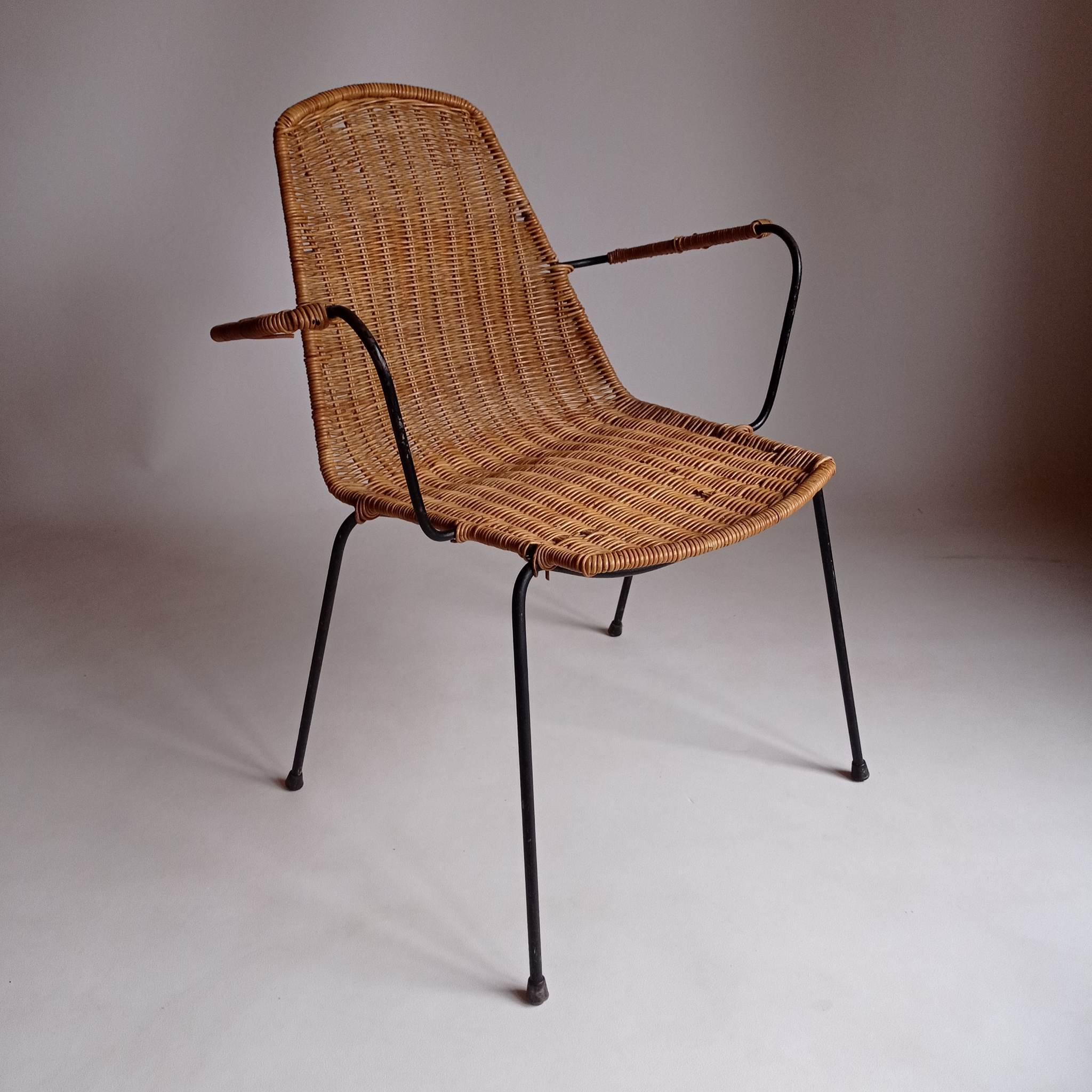 Wicker chair with Campo and Graffi armrests from the 60s.