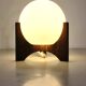 Raak Amsterdam Hokusai D-2022 table lamp in wenge & opal glass