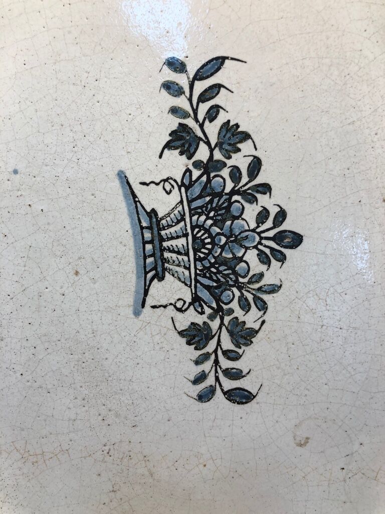 Faience dish "black ass" with floral pattern 18th century