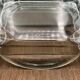 Teak tray and its 4 stackable glass dishes • Denmark • 1960