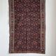 Iranian rug with stylised floral patterns in pink and blue, 155x105.
