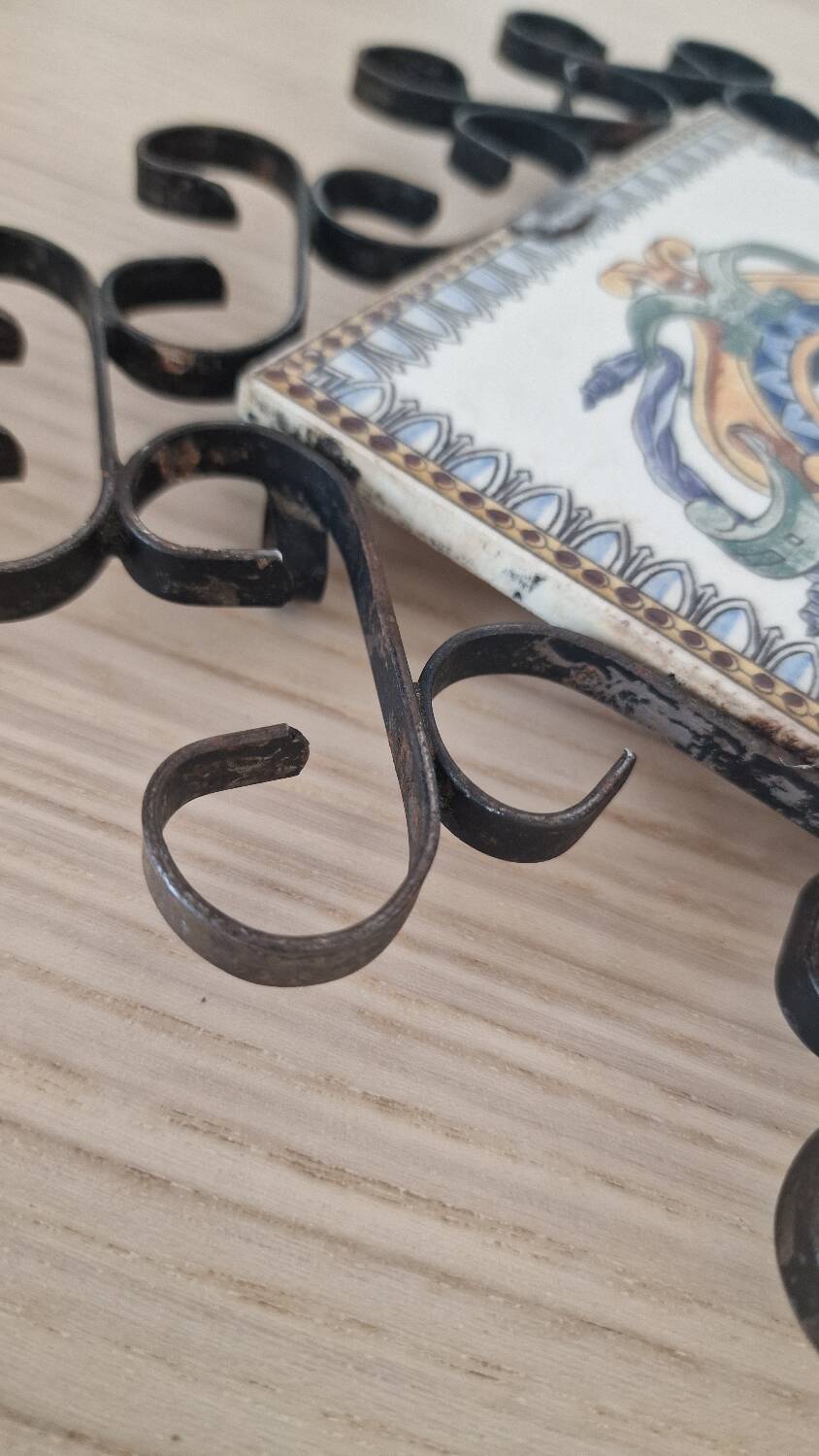 Hand painted gien tile on wrought iron trivet