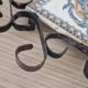 Hand painted gien tile on wrought iron trivet