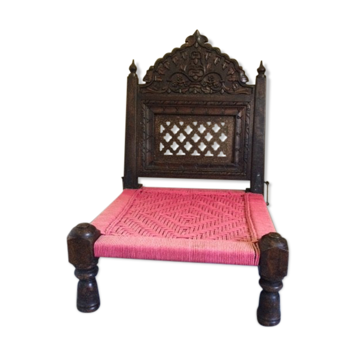 Old Indian armchair carved wood and pink braided rope India antics