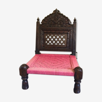 Old Indian armchair carved wood and pink braided rope India antics