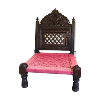 Old Indian armchair carved wood and pink braided rope India antics