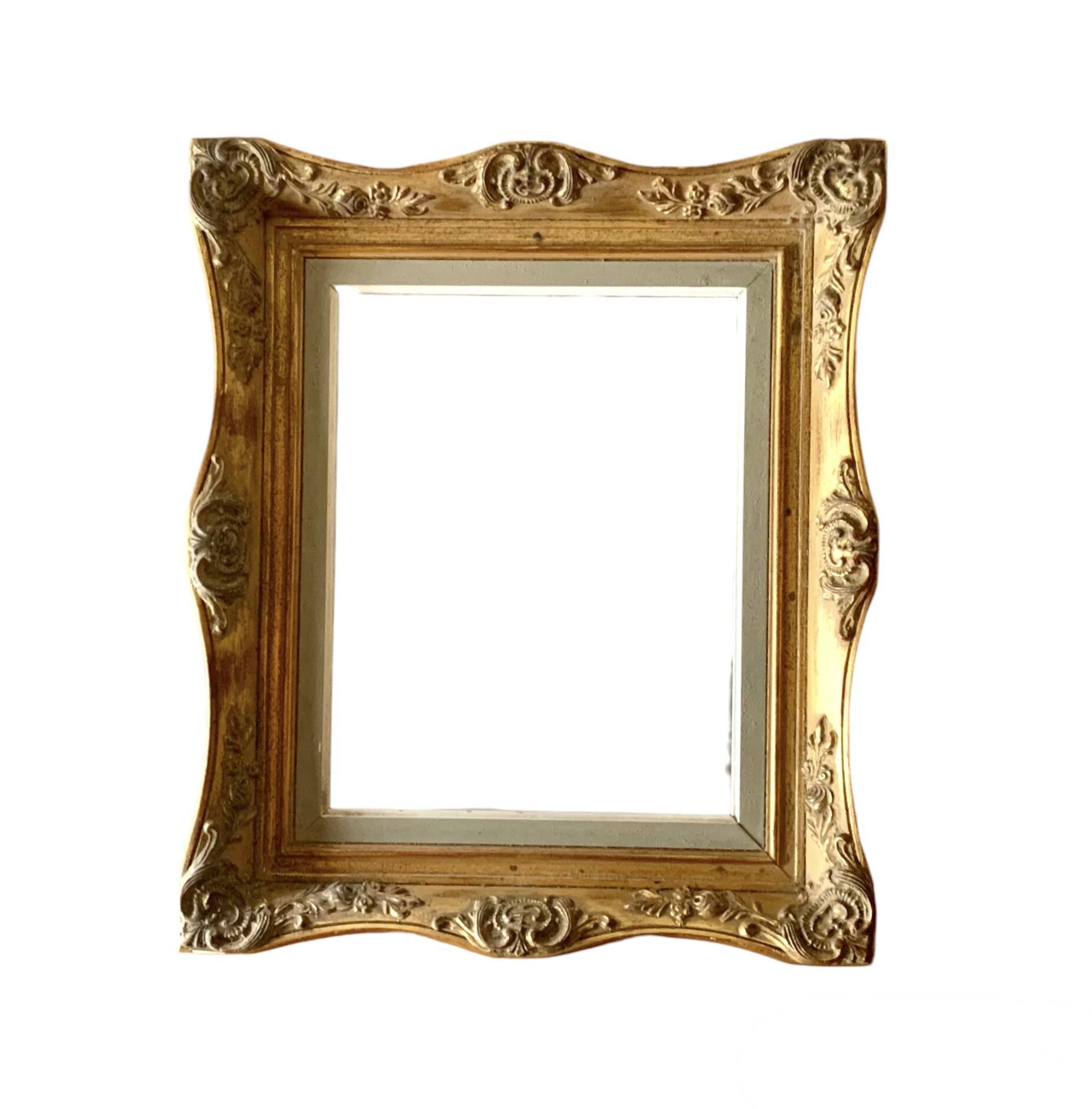 Old gilded carved wooden wall frame