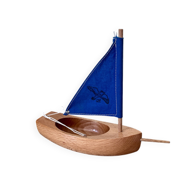 Petit voilier de bassin navigable en bois et coton, bel état