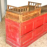 Former red patina and oak tray trading counter