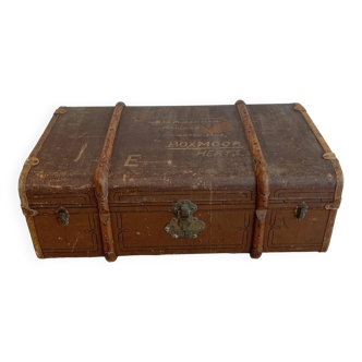 Old canvas trunk with wooden reinforcements