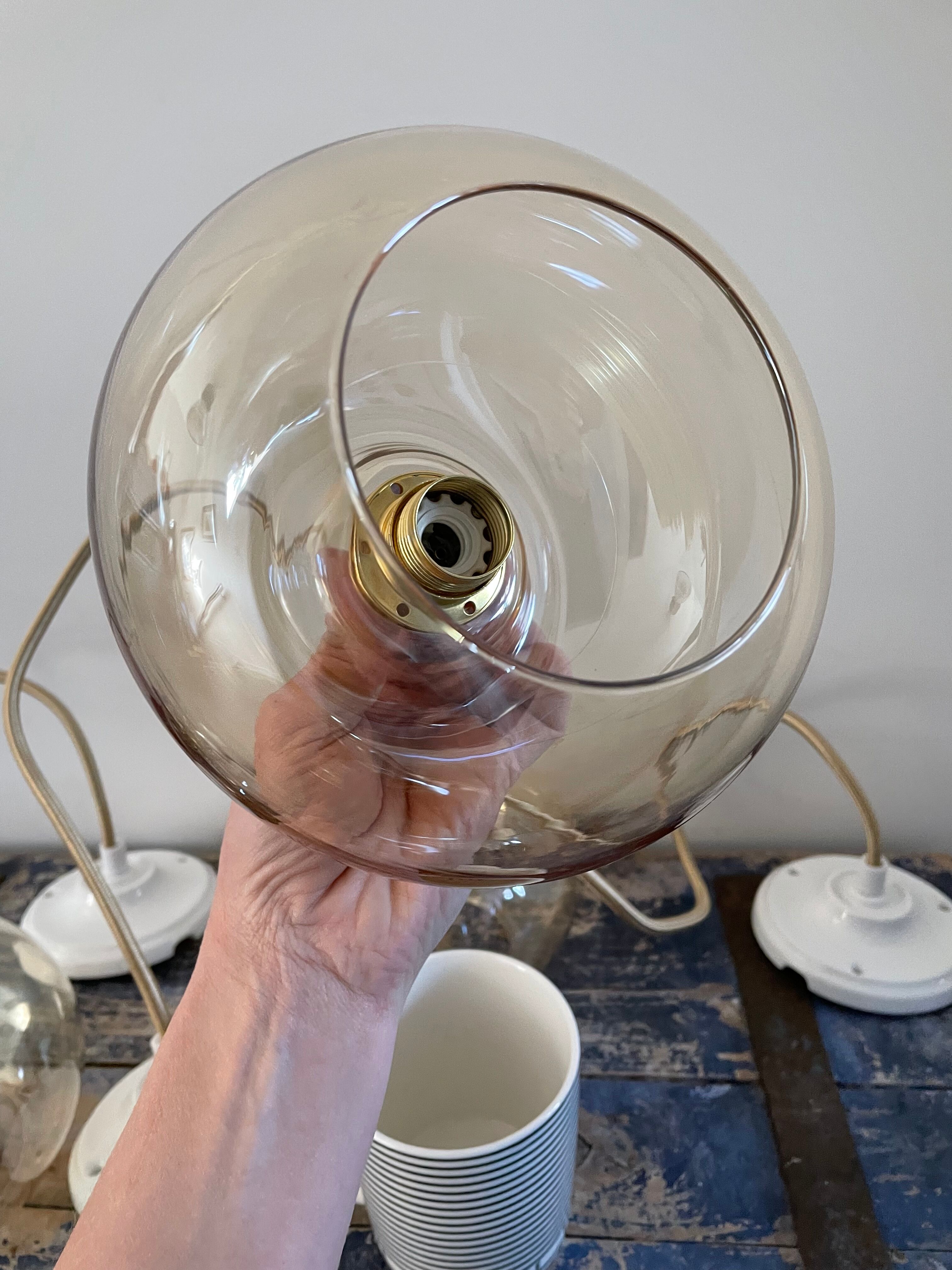 Set of three glass hanging lamps