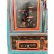 Restored antique Vietnamese wardrobe with care.
