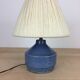 Blue ceramic lamp foot and white wool lampshade