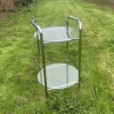 Pedestal table, vintage chrome steel saddle with 2 round windows