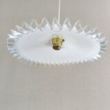 Notched opaline suspension