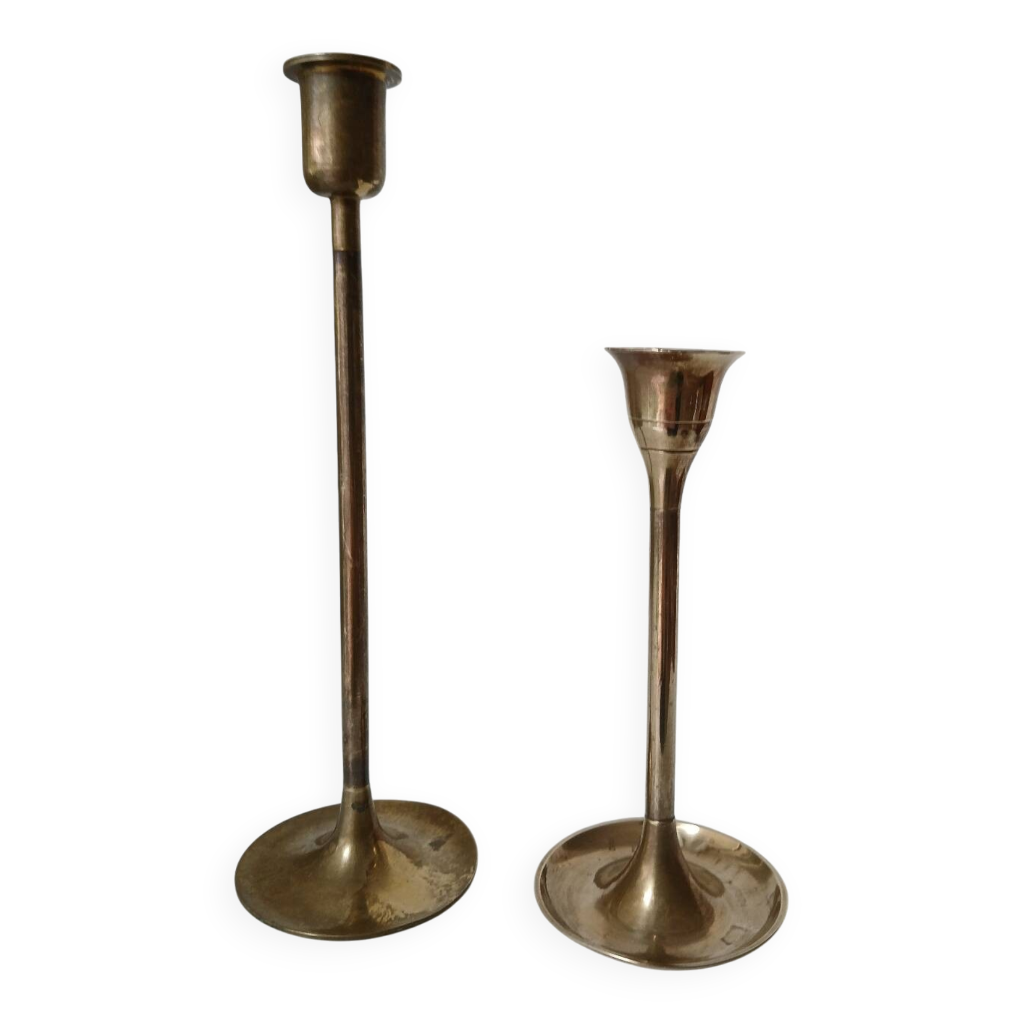 Set of two straight brass candlesticks.
