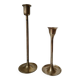Set of two straight brass candlesticks.