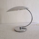 Lamp of the 70s in chrome metal.