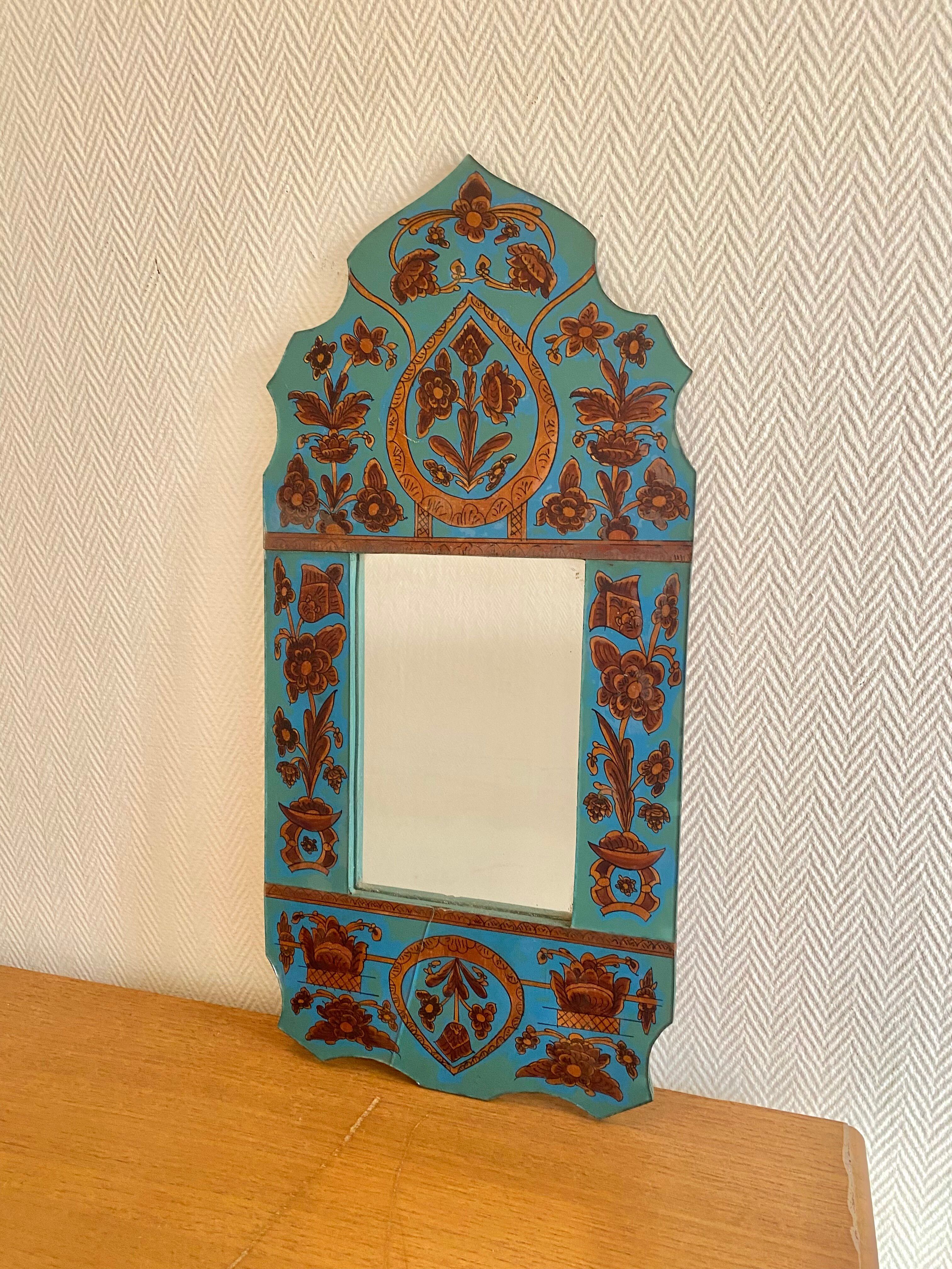 Vintage oriental wall mirror decor under glass