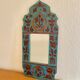 Vintage oriental wall mirror decor under glass