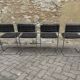 Four vintage chairs from the 1960s and 1970s, chrome with faux leather.