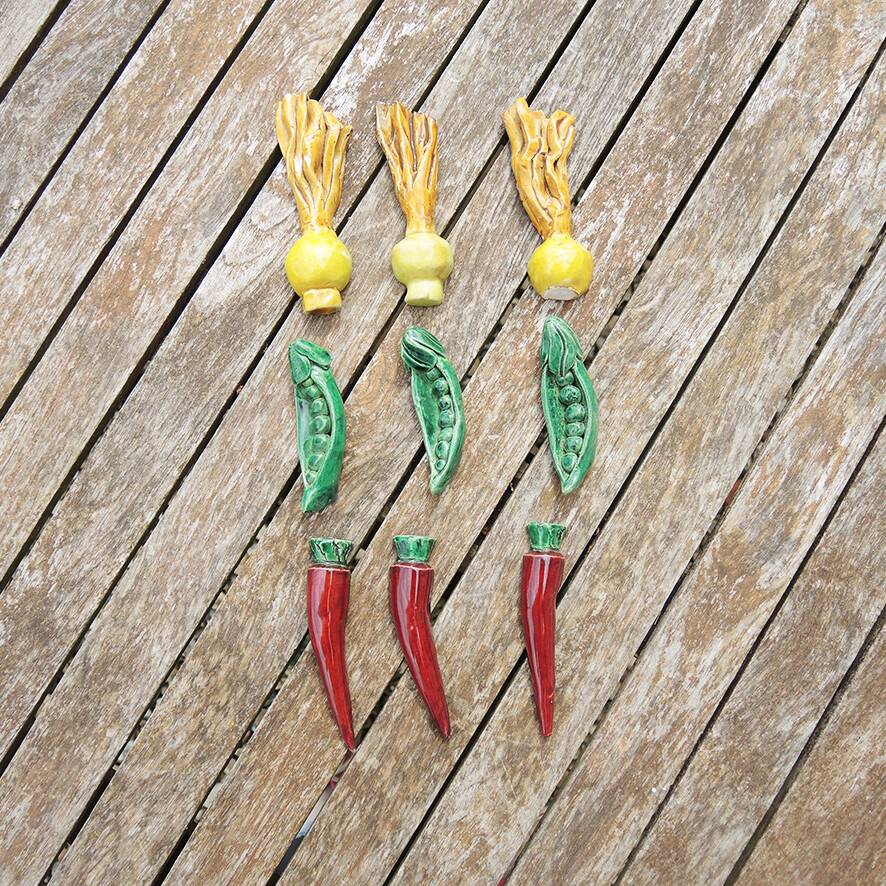 9 old vegetable knife holders in slip