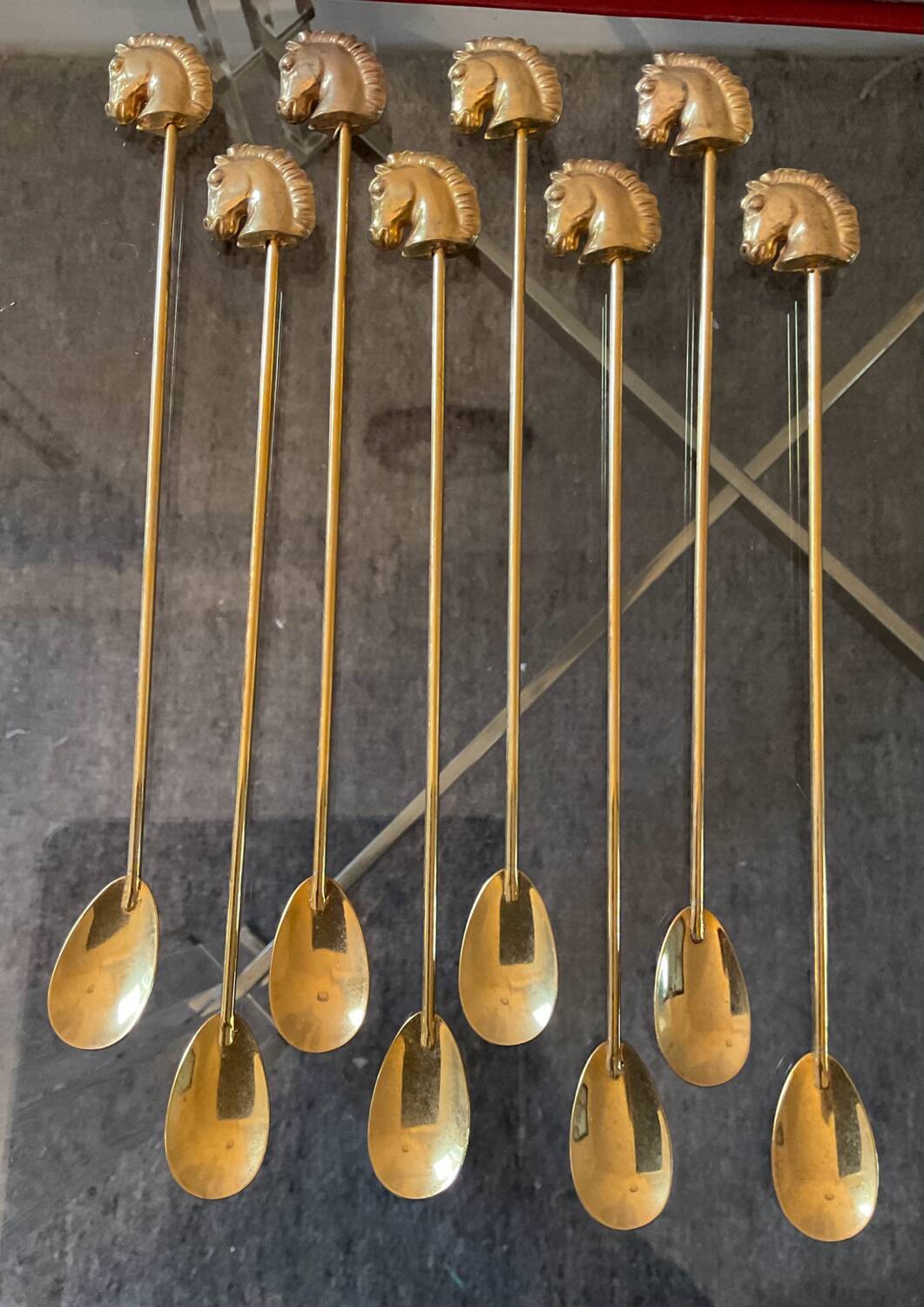 Series of 8 vintage golden spoons