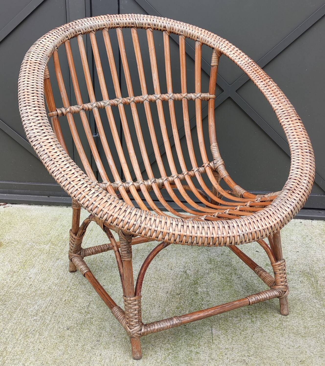 Vintage rattan shell basket armchair