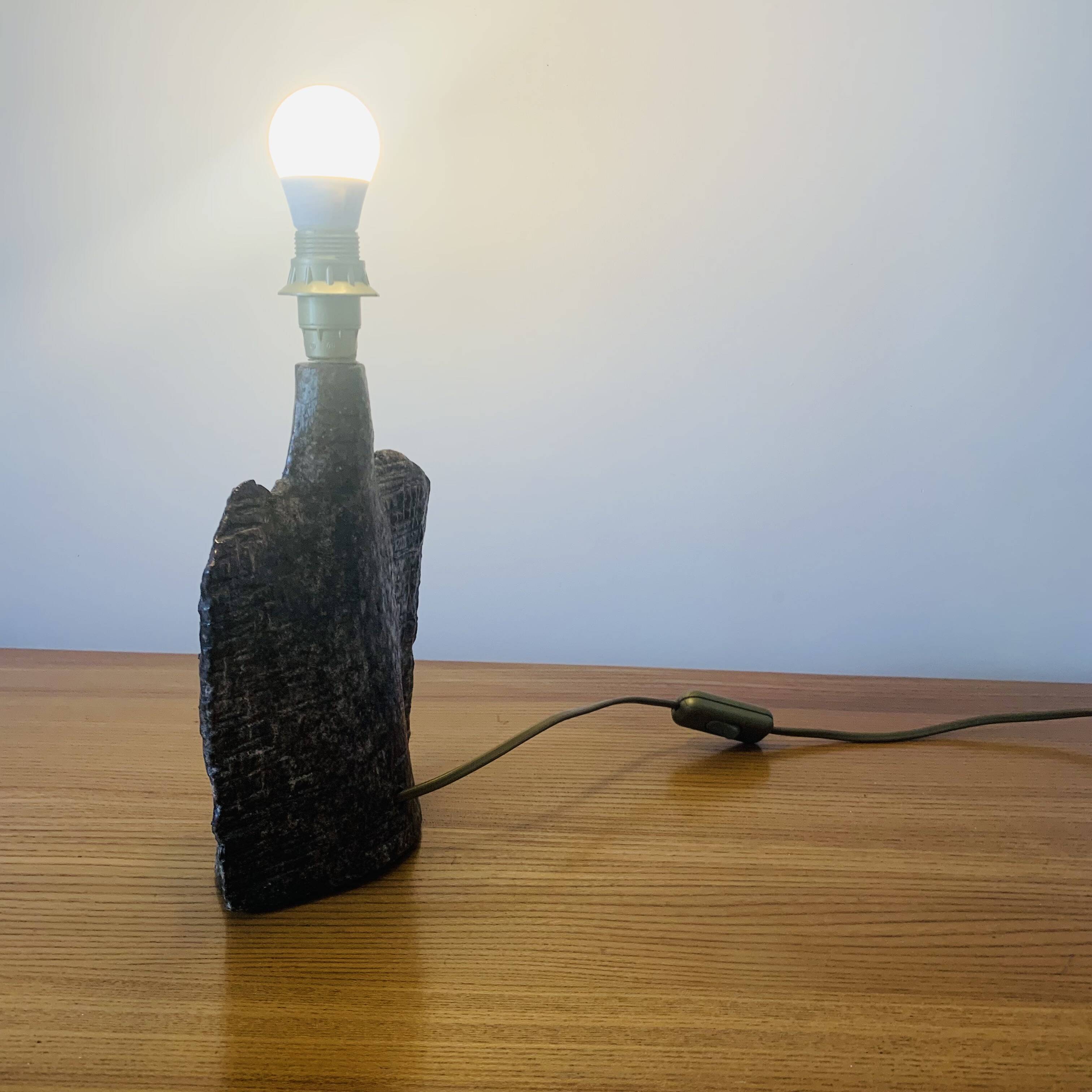 Sandstone lamp in the shape of a woman's bust
