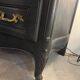 Black and wood chest of drawers