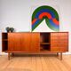 Danish teak sideboard with sliding doors and drawers, 1960s.