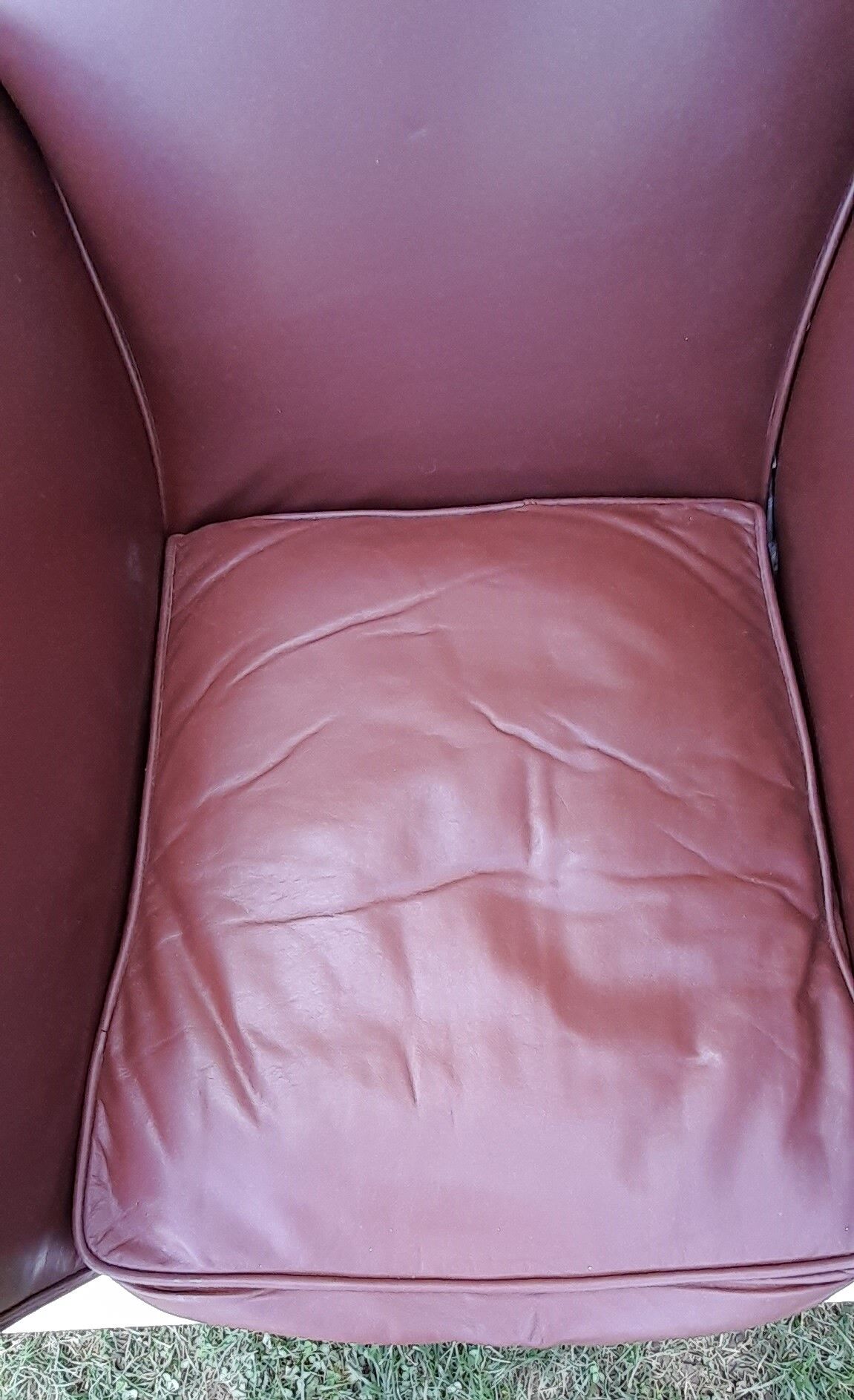 Club armchair in brown skai back mustache