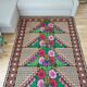 Brown wool rug with colorful boho flowers 142x196cm