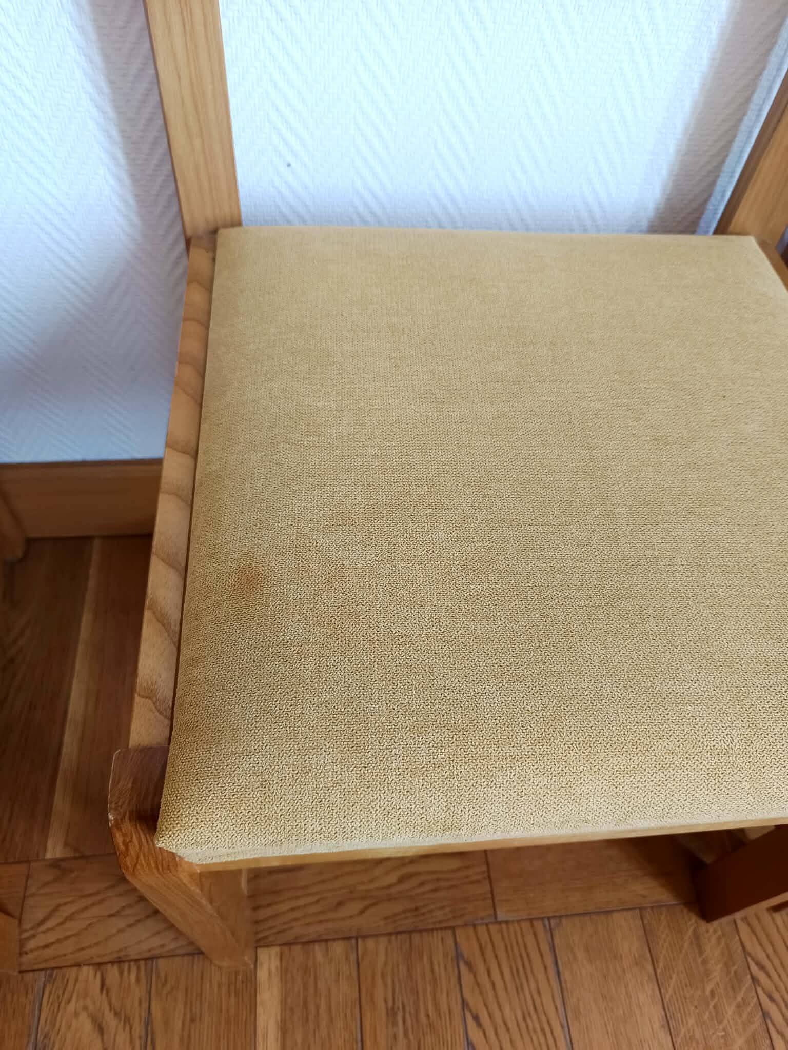 Six Scandinavian style chairs in elm and fabric.