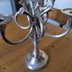 Ercuis pair of candlesticks model Cheverny in silver-plated metal with hunting horn decoration.