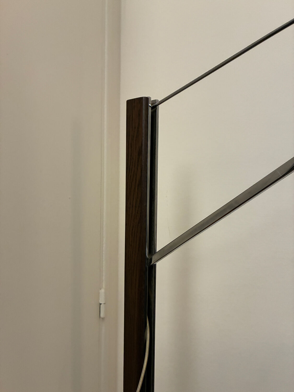 Cinna floor lamp in wood, chrome, and fabric.