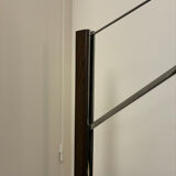 Cinna floor lamp in wood, chrome, and fabric.