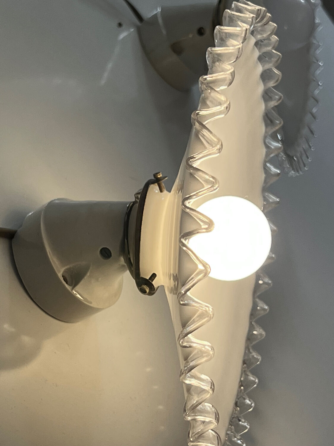 Pair of Art Deco wall sconces in scalloped opaline glass and porcelain