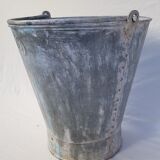 Old bucket with thick zinc handle
