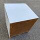 White Scandinavian bedside table in boat style made of wood.