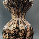 Vase signed in Murano Venice crystal with gold inclusion on a black background