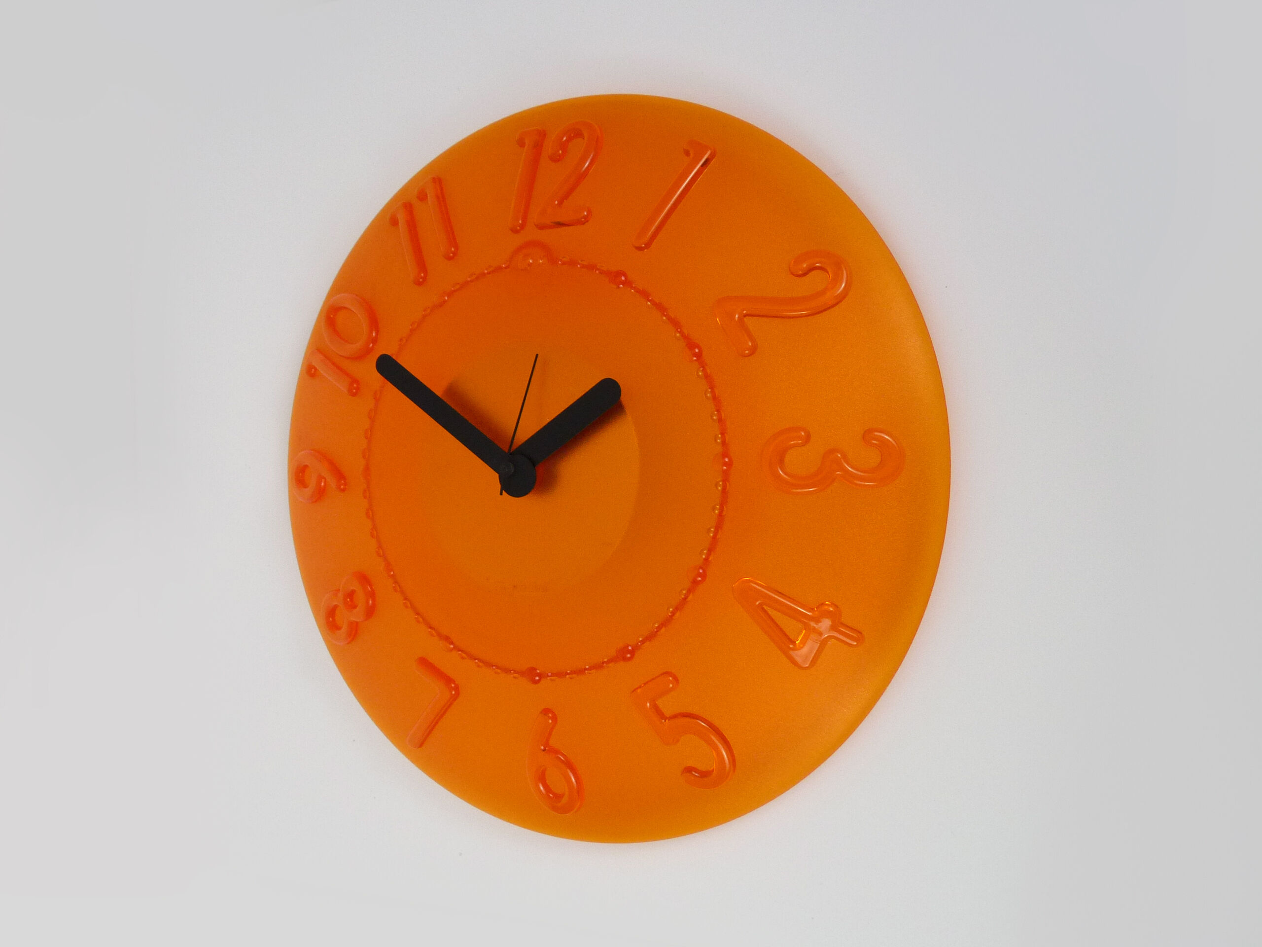 Guzzini orange wall clock from the 1980s